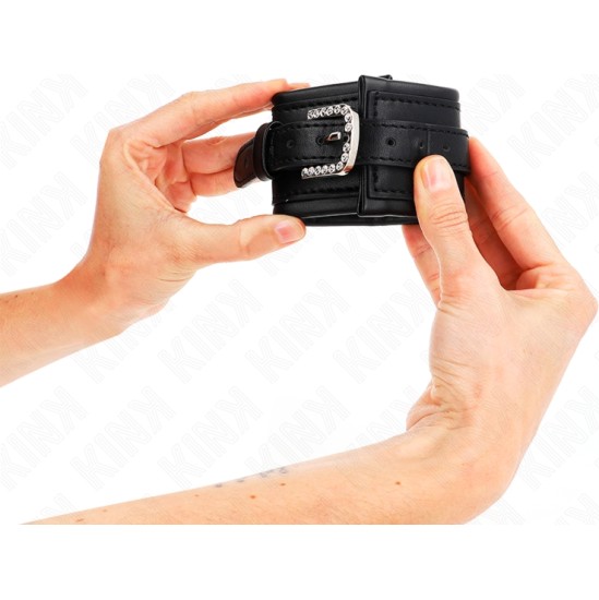 Kink Wrist Restraint KINK - RHINESTONE BUCKLE WRIST RESTRAINTS BLACK ADJUSTABLE 25-32 CM X 5.5 CM